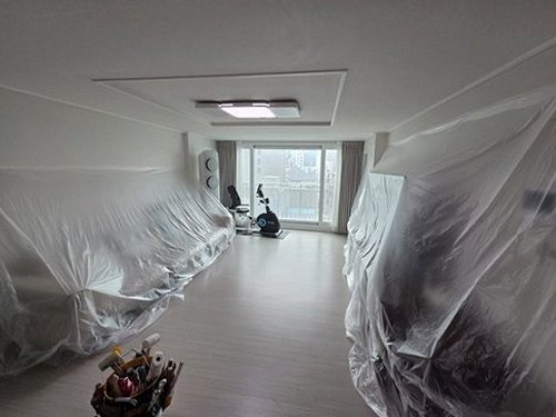 신교동 연립주택 4층 거실 벽면 시공 후기 사진
